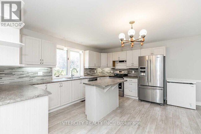 Photo du bâtiment - 7512 5th Side Rd