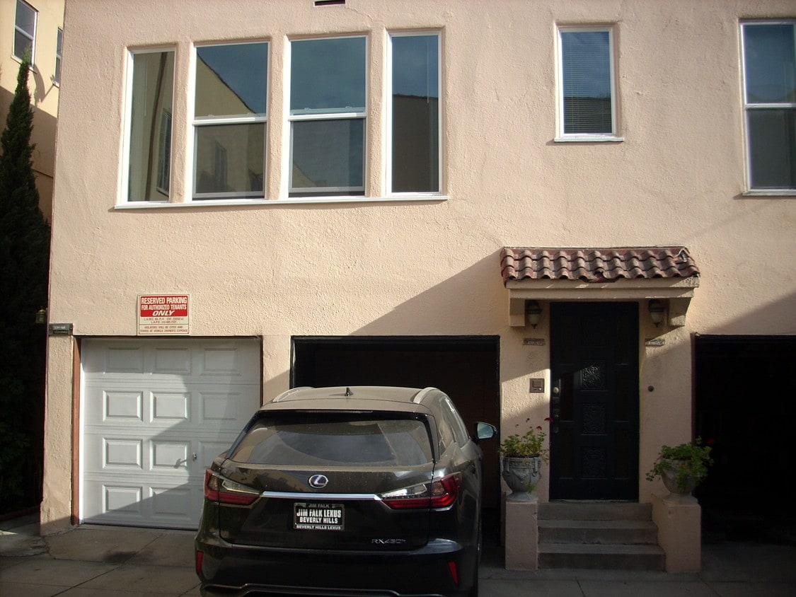 Rear building. Apartment entrance. - 8264 Norton Ave