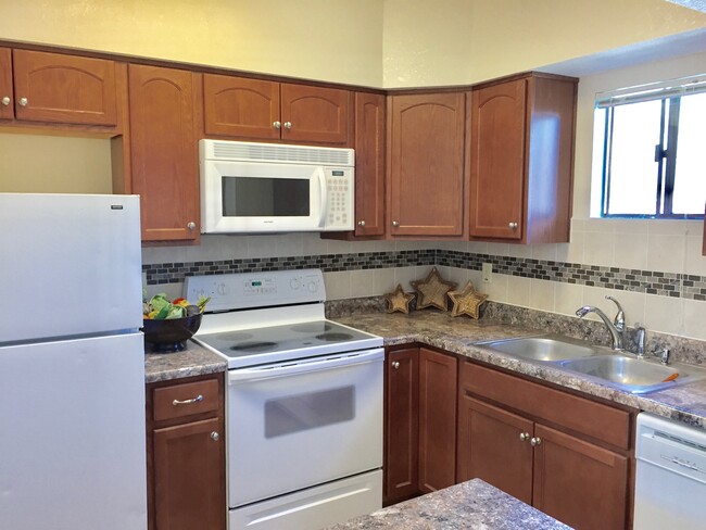 Wonderful Kitchen has Dishwasher, Microwave, Smooth Top Stove & Refrigerater - 2855 N Palo Verde Ave