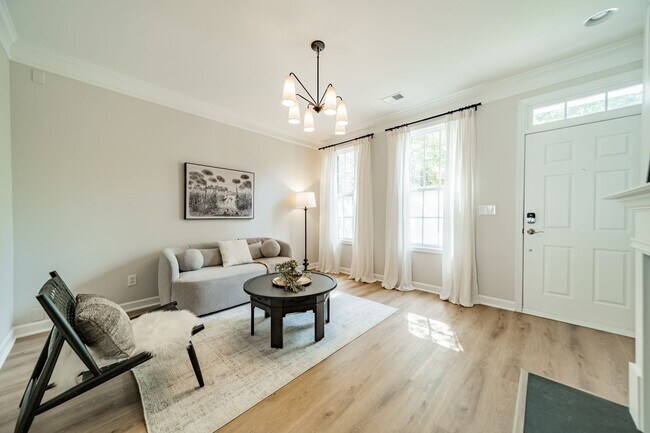 Building Photo - UPGRADES! Two Bedroom Townhouse - Six Mont...