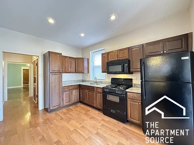 Foto del edificio - 5023 N Ridgeway Ave