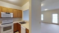 This two-floor residence offers a clean, neutral aesthetic throughout, with warm beige walls and plush wall-to-wall carpeting across the main living and bedroom areas. The kitchen is efficiently designed with warm wood cabinetry, light countertops, and a full suite of white appliances including a refrigerator, electric range, microwave, and dishwasher, complemented by tile flooring for easy maintenance. Adjacent to the kitchen, the open living area benefits from multiple windows that invite generous natural light and provide access to an exterior door. A wide carpeted hallway connects the main living spaces and leads to generously sized rooms, including a bedroom suite with a ceiling fan and a connected private bathroom. A second full bathroom features a tub-shower combination, a wood-vanity with a single sink, and classic tile flooring with a decorative accent pattern. A dedicated laundry closet houses a stacked washer and dryer unit alongside a water heater, adding to the home's practical conveniences. Throughout both floors, the consistent use of white trim, louvered closet doors, and flush-mount ceiling lighting creates a cohesive, move-in-ready atmosphere suited for comfortable everyday living.