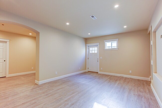 Flex Space and Living Room. Door to external heated stairway. - 2708 Ironton St