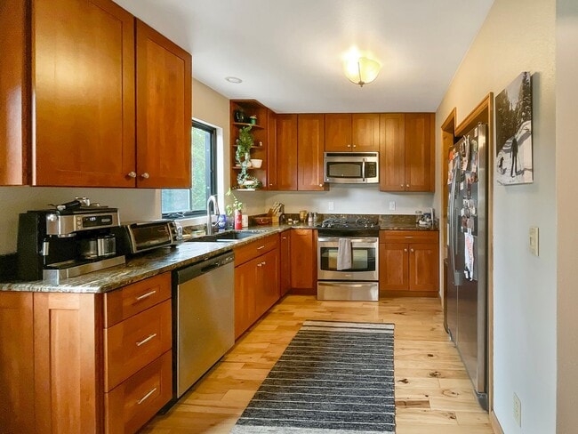 Building Photo - 2 Car Garage! Pets Negotiable! Two living ...