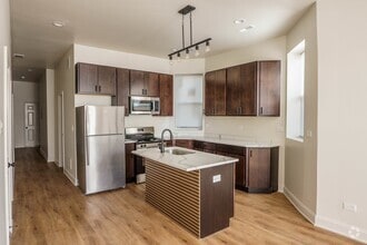 Building Photo - 6613 S Vernon Ave