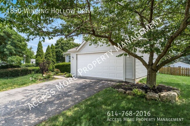 Building Photo - AN ENCHANTING 2-STORY HOME IN THE HEART OF...