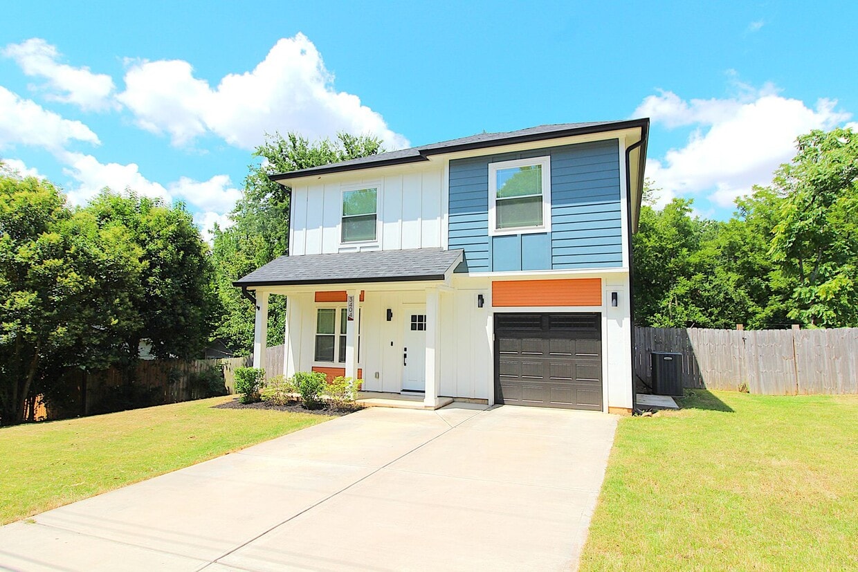 Primary Photo - Modern 3-Bedroom Home with Fenced Yard & U...