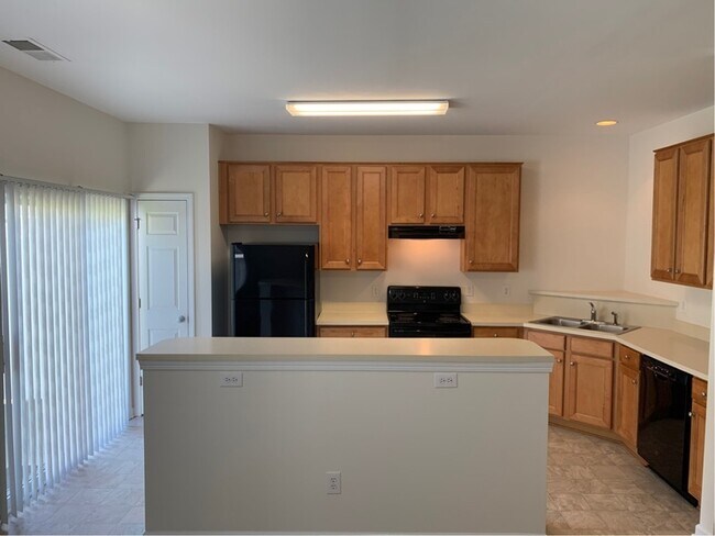 Foto del edificio - 8583 Carolina Lily Ln
