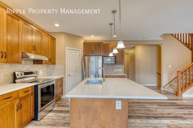 Photo du bâtiment - AMAZING 4 BEDS/ 3.5 BATHS HOUSE IN THE COMMUNITY OF EVERGREEN