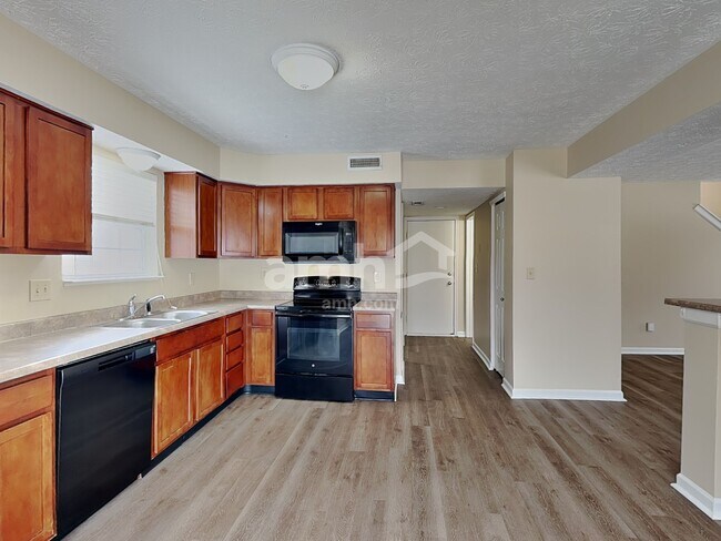 Foto del edificio - 5640 Rambling Dr