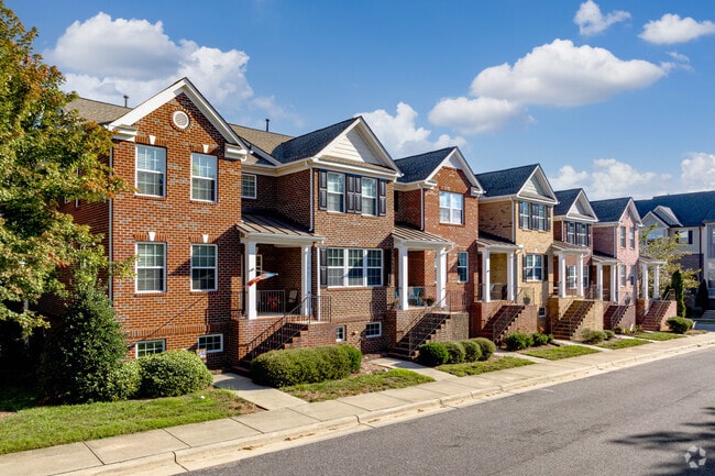 Some residents of Apex prefer traditional brick townhomes.