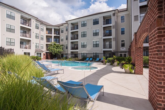 Outdoor Resort-Style Pool, Hot Tub, and Sundeck - The Cosmopolitan at Lorton Station