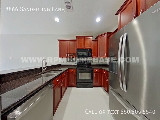 Foto del edificio - 8866 Sanderling Ln