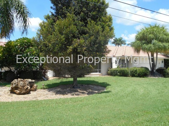 Building Photo - Spacious Home with Luxurious Primary Suite + Den on Oversized Gulf Access Lot!