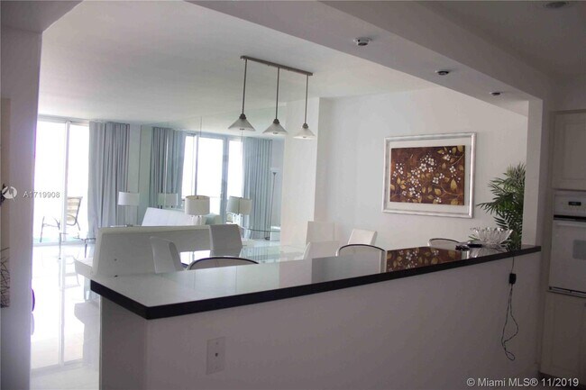Building Photo - 19370 Collins Ave