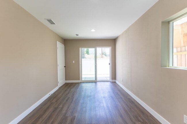 living room/ bonus room - 8424 Grenoble St