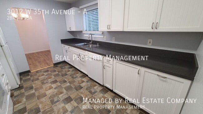 Building Photo - 3012 W 35th Ave