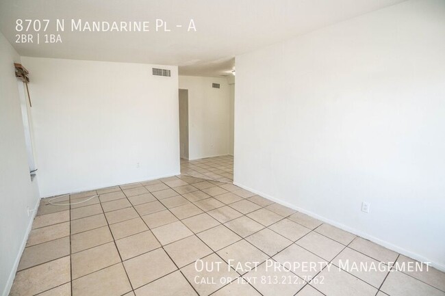 Building Photo - 8707 N Mandarine Pl