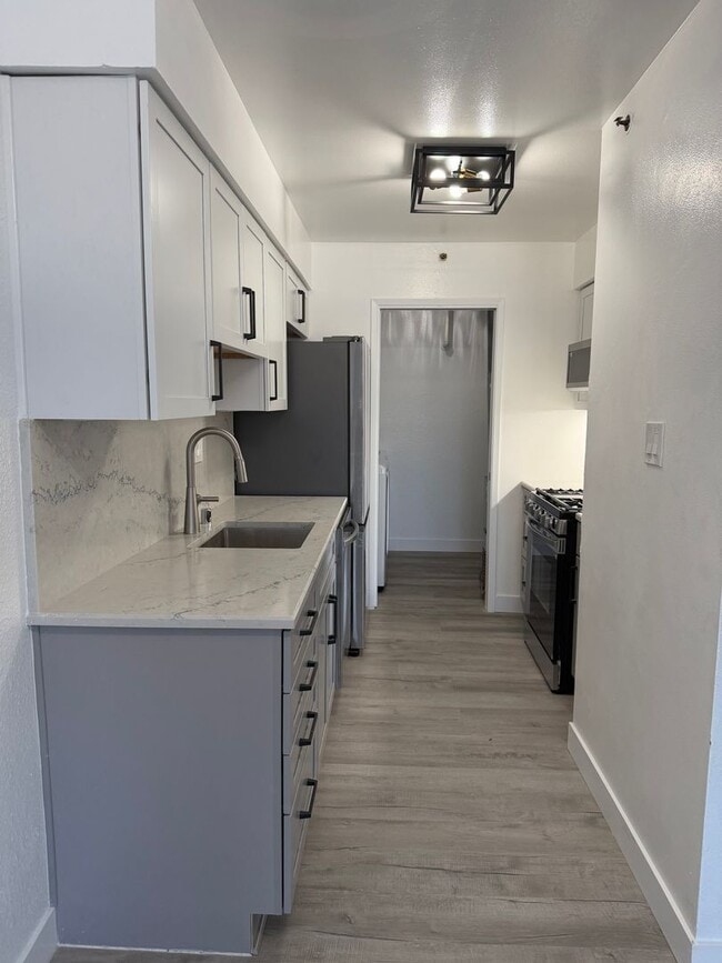 Building Photo - Beautifully remodeled 2-Bedroom, 1-Bath, 2-car tandem Condominium