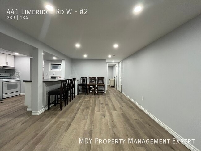 Building Photo - Welcome home to this warm and inviting low...