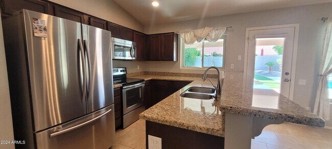 Building Photo - 8974 E Sutton Dr