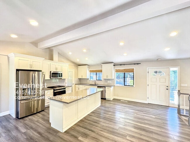 Building Photo - Spacious 4-Bedroom Home with Fireplace, De...