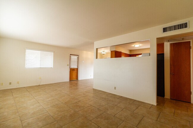 Building Photo - Introducing a captivating Living Space tha...