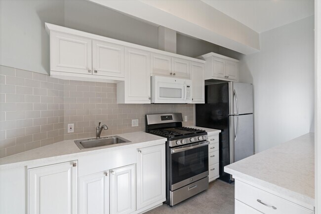 Updated kitchen with Gas stove - 2121 James M Wood Blvd