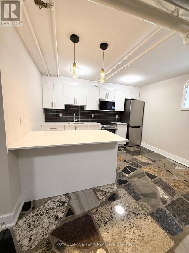 Photo du bâtiment - 325 Cooper St