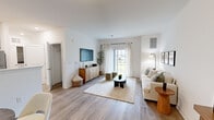 Located at 20 Franklin Ln in Manalapan, NJ, this thoughtfully designed one-bedroom, one-bathroom residence offers a comfortable and modern single-floor layout. The open-concept living and dining area is bathed in natural light from large windows and a sliding glass door, highlighting the smooth light wood-tone flooring that flows throughout the main living spaces. The living room provides generous room for relaxing and entertaining, with clean white walls that lend a bright, airy ambiance.

The kitchen features gray shaker-style cabinetry, crisp white countertops, a stainless steel appliance suite including a gas range, microwave, dishwasher, and refrigerator, and a functional galley-style layout that maximizes efficiency. A dedicated closet off the kitchen adds valuable storage.

The bedroom is a serene retreat, carpeted for comfort and filled with natural light from a large window with outdoor views. It includes access to a well-sized closet with built-in shelving, providing ample storage. The bathroom is finished with elegant marble-style tile flooring, gray vanity cabinetry, and a tub-shower combination, creating a clean and polished space. The overall design palette is neutral and cohesive, offering a calm, modern aesthetic throughout.