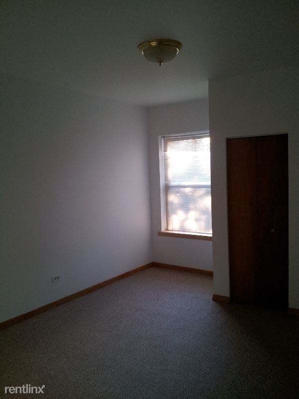 Building Photo - 1 br, 1 bath Apartment - 7445 S Paxton Ave