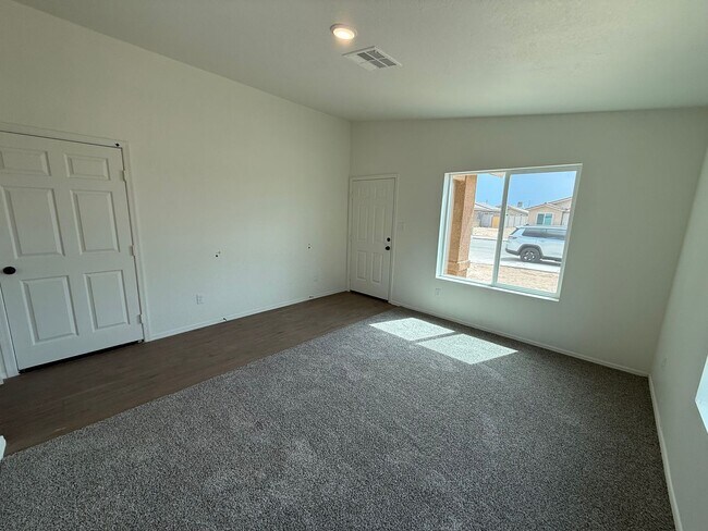 Building Photo - BRAND NEW 4 Bedroom in Desert Sands!