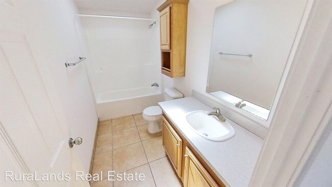 Building Photo - 4 br, 3 bath House - 1002 W 7th St.