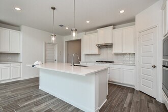 Building Photo - 7711 Pale Petunia Trl