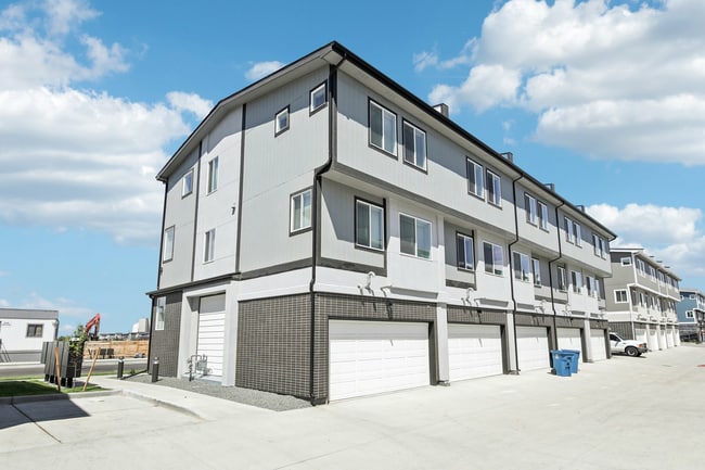 Building Photo - The Rowhomes at Greyhound Park