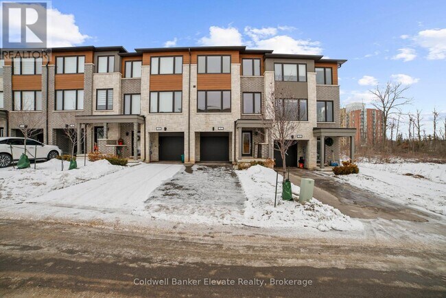 Photo du bâtiment - 42 Wind Tree Wy