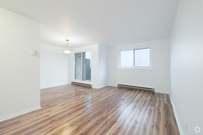 2BR, 1BA - 800SF - Living Room - Place Des Vosges 6000-6010