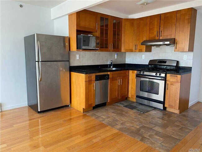 Building Photo - 93-05-93-37 37th Ave