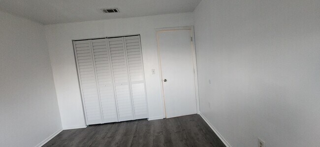 New doors for closet in bedroom 1 - 1552 University Ln