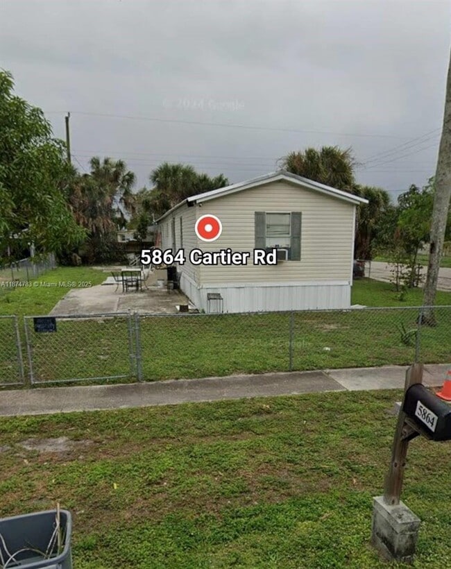 Building Photo - 5864 Cartier Rd