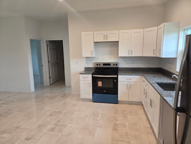 Building Photo - BRAND NEW CONSTRUCTION-3/2/1-MOVE IN READY