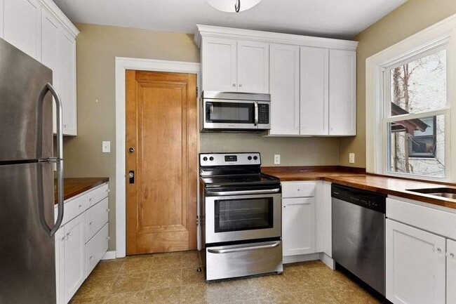 Kitchen and side entry stairwell door - 4532 Garfield Ave