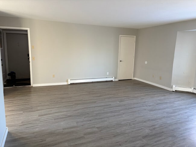 Living Room/Front Door - 8000 E 10th Ave