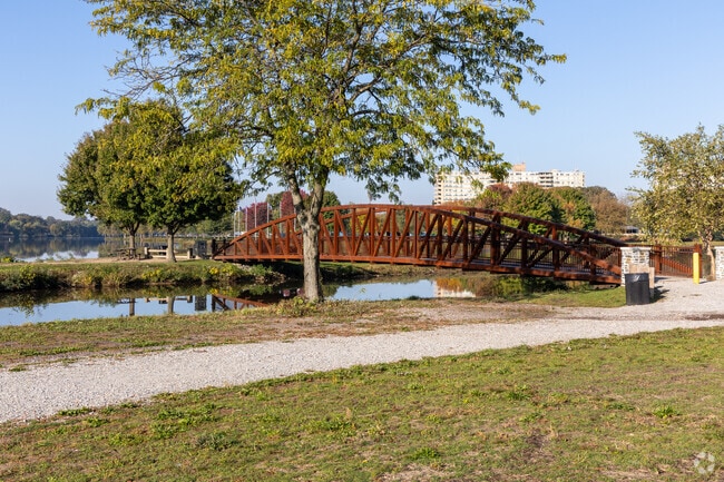 The walking path and bridge at Cooper River Park offer a scenic route just minutes from Haddon Township.