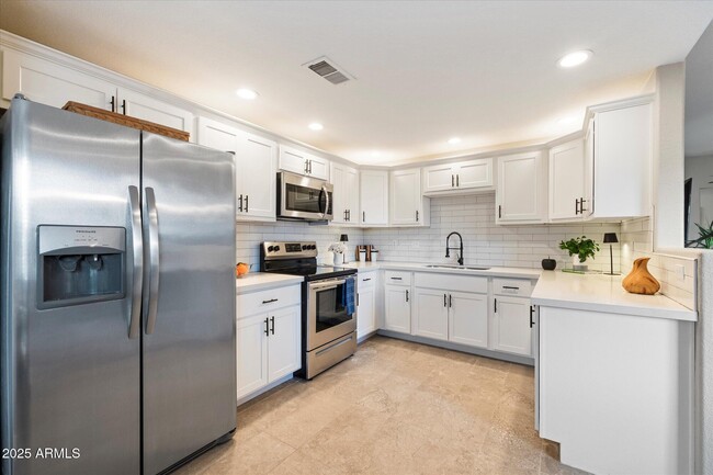 Building Photo - 9455 E Raintree Dr
