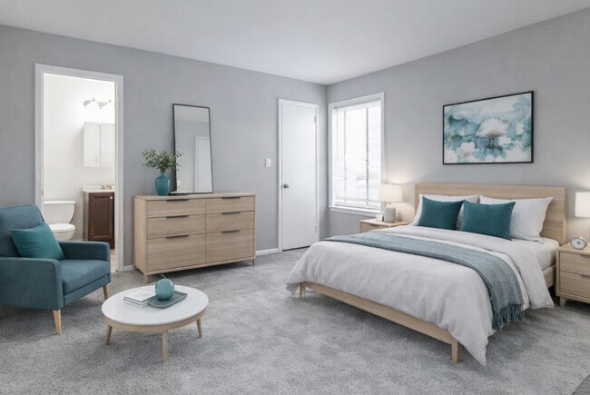 Primary Bedroom with Ensuite Bathroom - Barkley Village Apartments