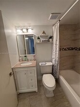 Building Photo - 6095 N Sabal Palm Blvd