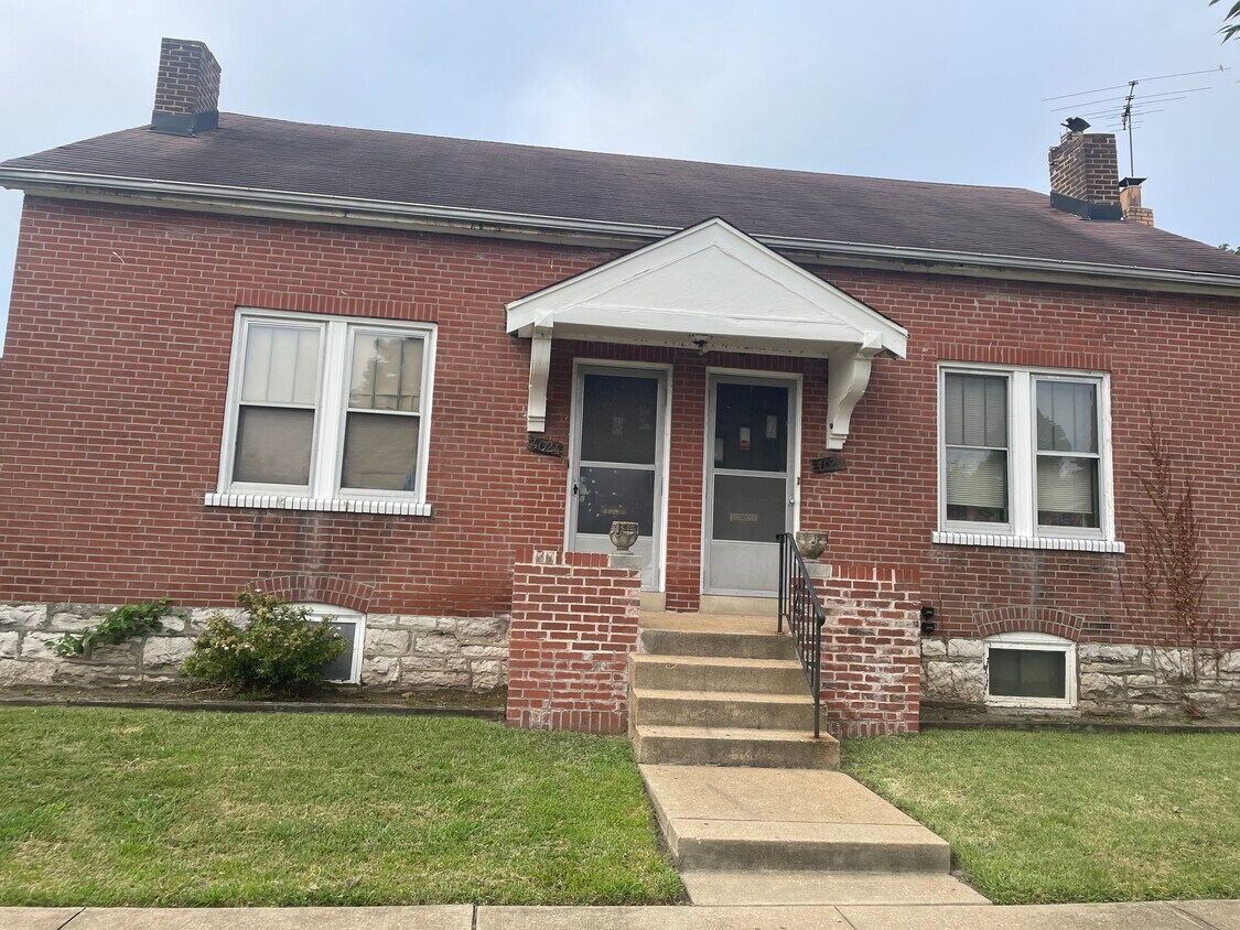Door on left - 4024 Tholozan Ave