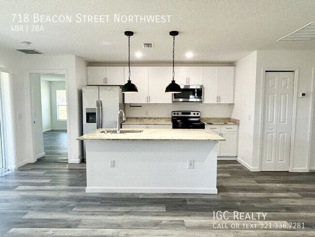 Building Photo - "Modern 4-Bedroom Home with Granite Counte...