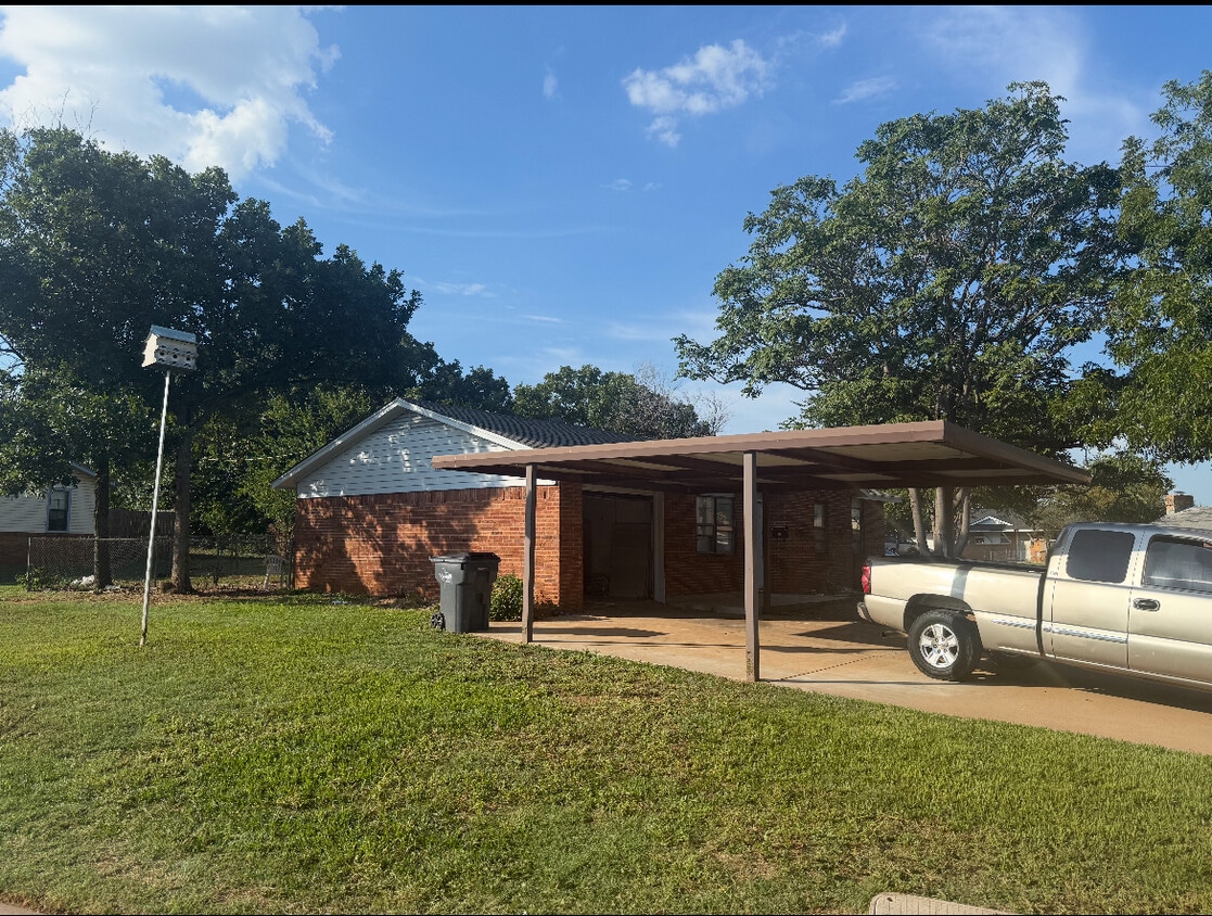 Covered parking with attached garage - 4100 Wrangler Dr